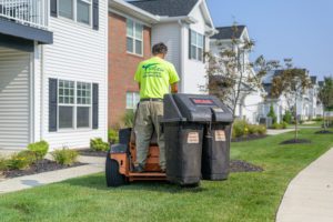 BruZiv landscaper mowing apartment complex