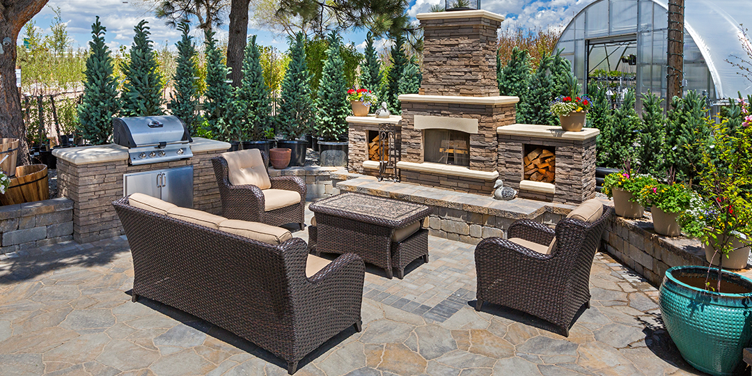 Beautiful outdoor patio with fireplace and built-in grill
