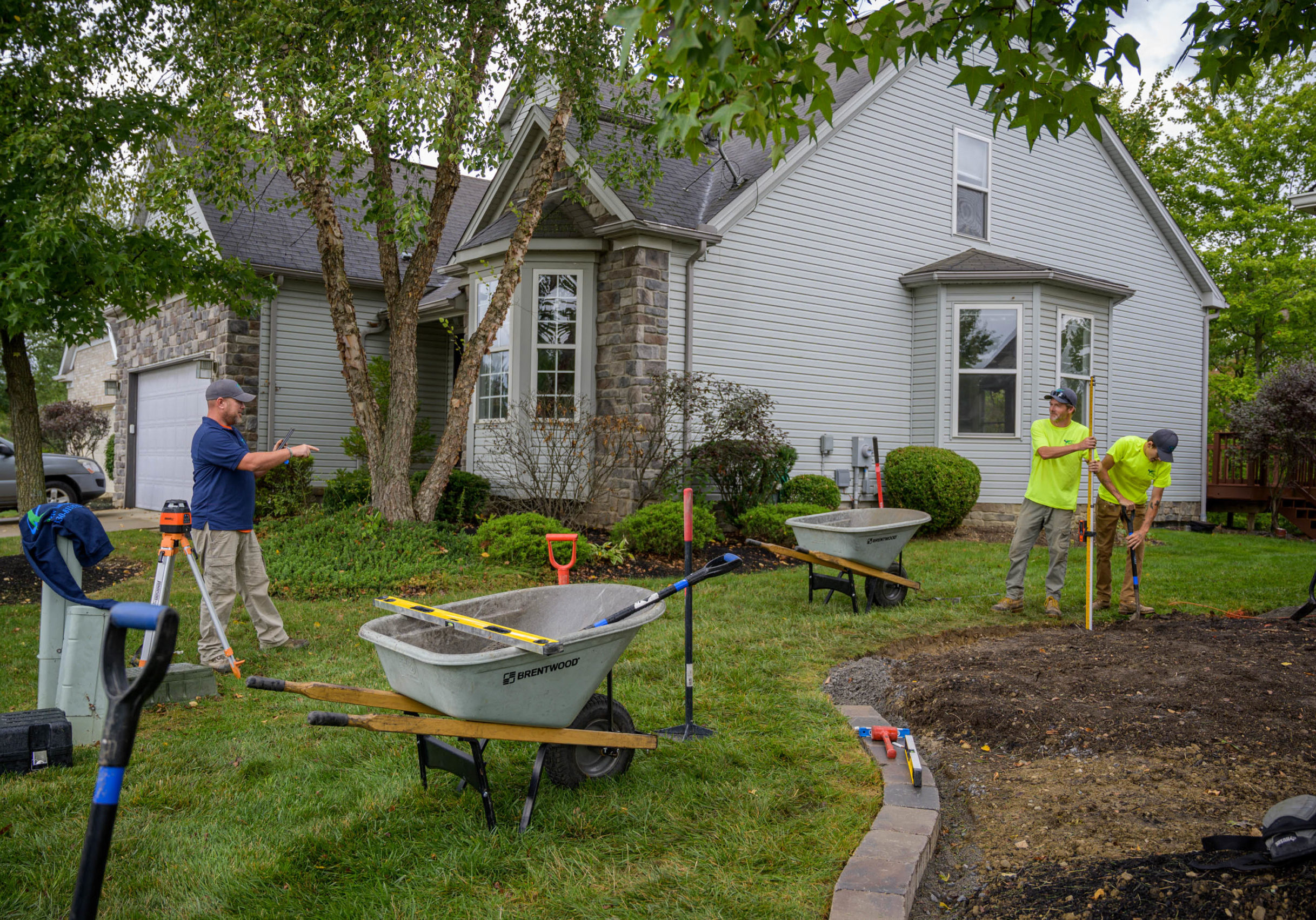 BruZiv landscape team installing new landscaping at established home in Northeas Ohio